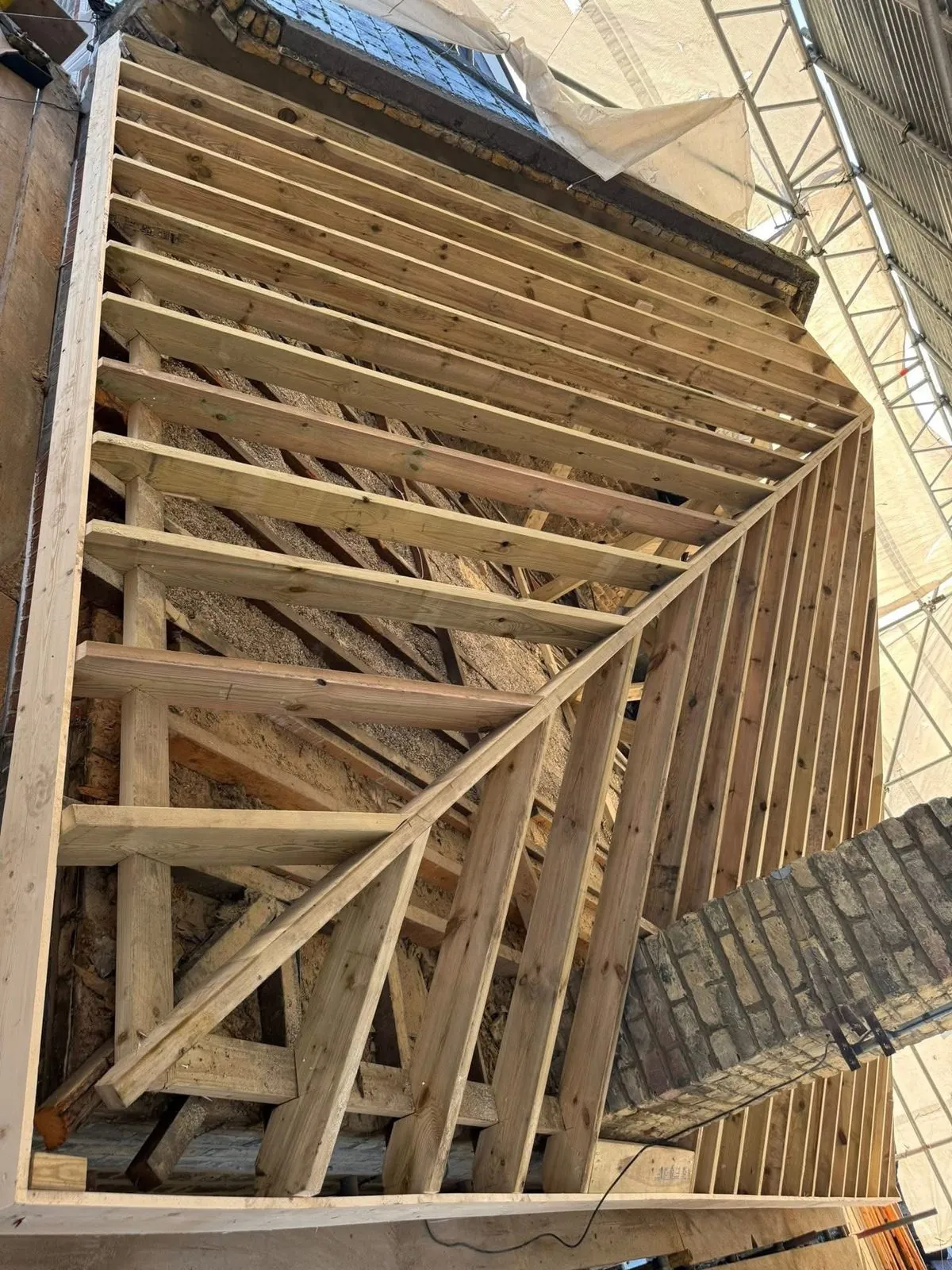 New roof timbers and rafters during a re-roof in Newton Abbot